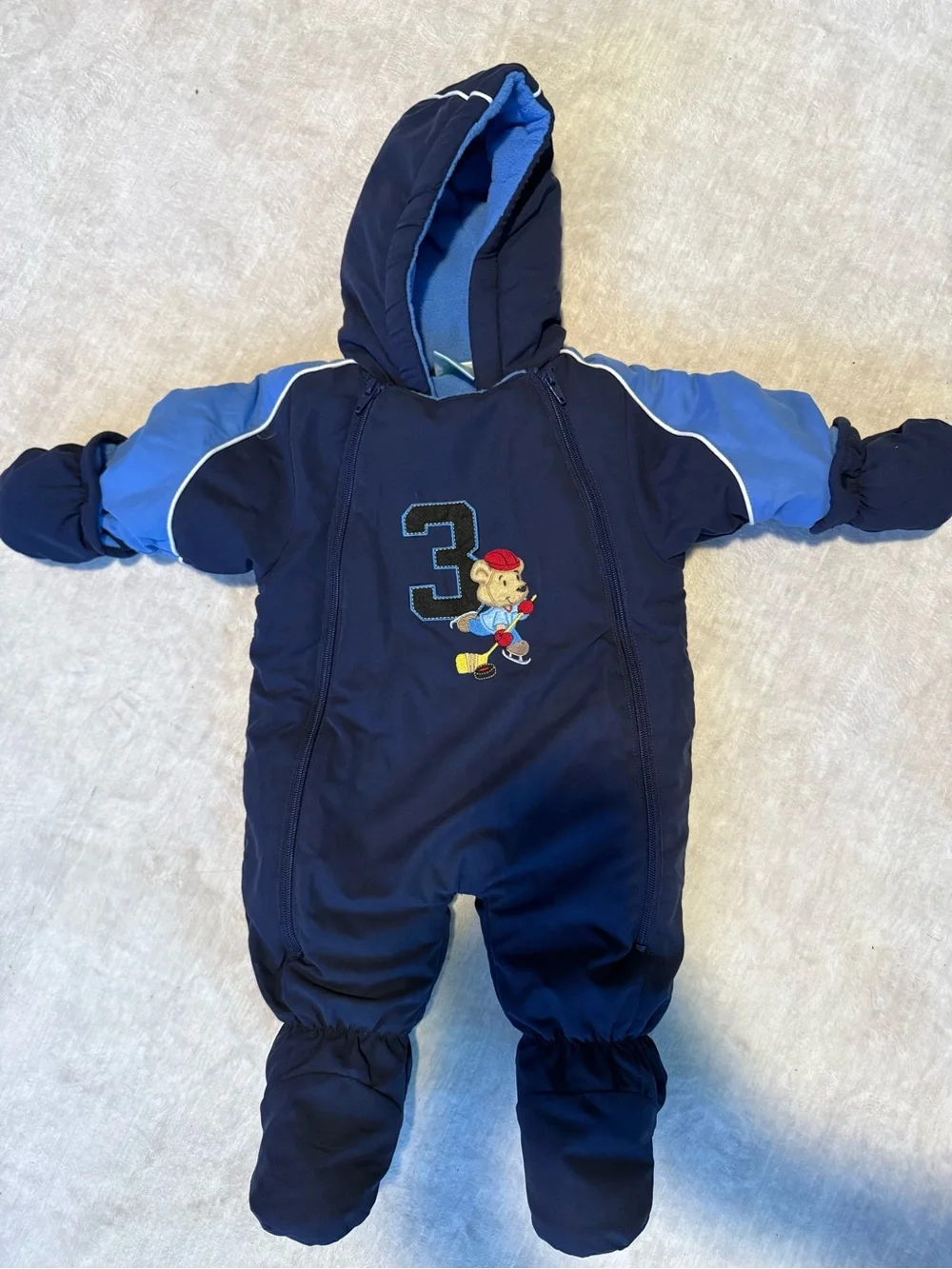 okie dokie Navy and Light Blue Hooded Baby One-Piece Snowsuit Hockey Bear